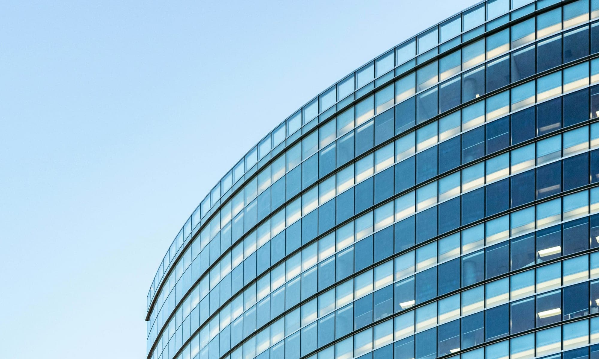 Curved glass office building facade